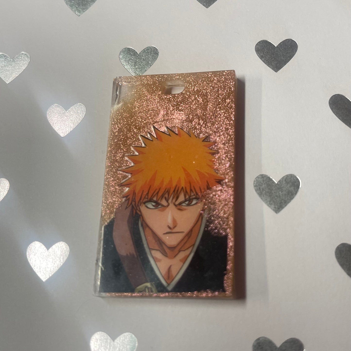“Defender” Recycled Manga Resin Mini Keychain