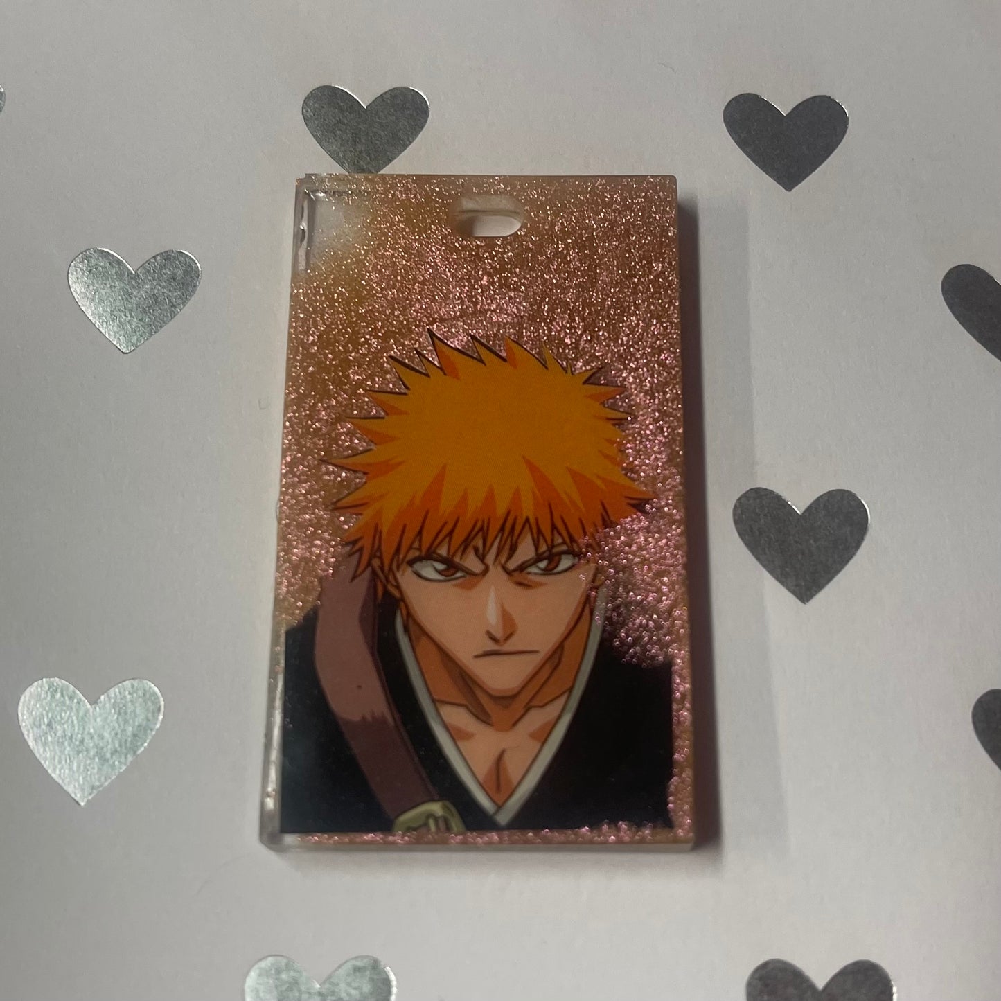 “Defender” Recycled Manga Resin Mini Keychain